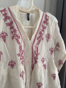 Embroidered Peplum Top
