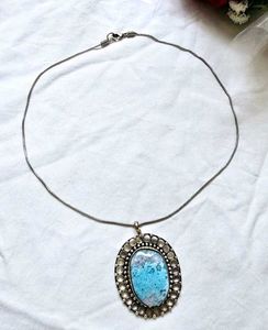 Unique Oval Pendant Necklace with Blue Gemstone
