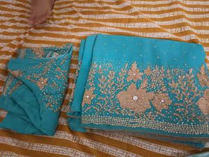 Turquoise Saree with Gold Embellishments