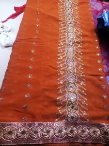 Elegant Orange Embroidered Saree