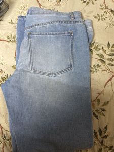 Distressed Light Wash Denim Jeans