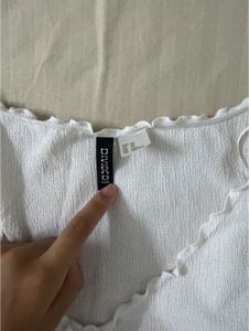 White Textured Top with Lettuce Hem