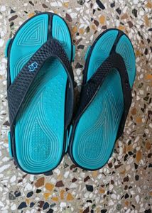 An almost new home slippers for little girls