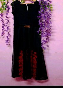 Elegant Black Lace Dress with Red Floral Detail