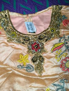 Peach Embroidered long Aline type frock