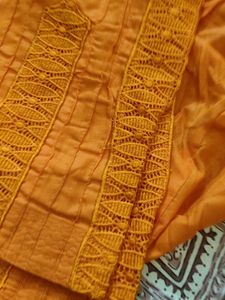 Elegant Orange  green salwars with Lace Detail