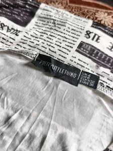 I. Newspaper Print Crop Top