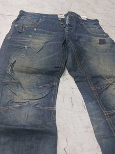 Distressed Blue Denim Jeans
