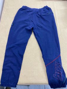 HRX Stylish Blue Track Pants with Accent Stripes
