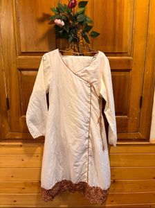 Elegant Cream Kurta with Embroidered Hem