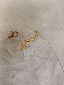 Delicate Gold Necklace with Red Stone