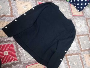 pullover with stylish button up sleeves