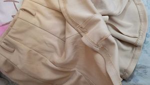 beige skirt or skort with in-built shorts