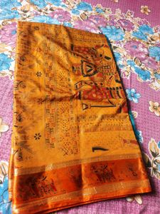 Vibrant Orange and Blue Silk Saree