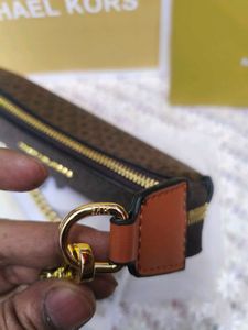 Michael Kors Monogram Crossbody Bag