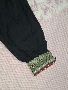Stylish Black Palazzos with Embellished Cuff