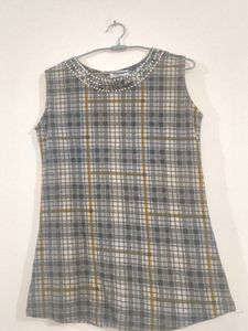 Chic Plaid Tunic with Embellished Neckline