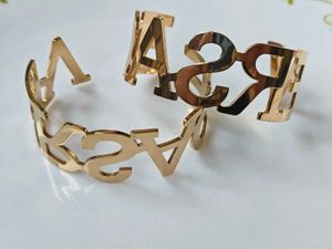 Statement Golden-Tone Bangle Bracelet