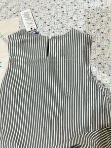 completely new Striped Peplum Sleeveless Top