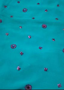 Teal Saree with Floral Embellishments