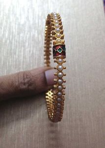 Elegant Pearl & Gold Bangle