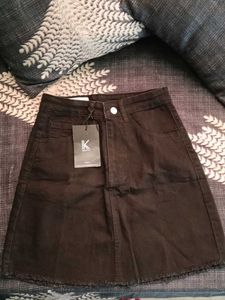 Black denim skirt