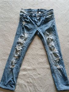 Distressed Light Wash Denim Jeans
