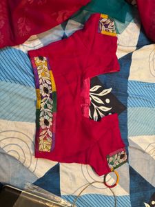 Vibrant magenta and green Floral Embroidered Saree