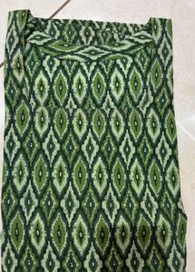 Stylish printed short kurti with square neck.
