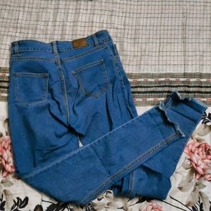Blue Denim Jeans with Frayed Hem