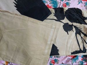 Elegant Beige Kurta Set with Black Leaf Print(unst