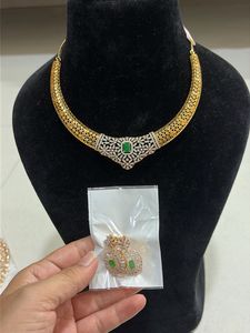 Brand new Gold and Emerald Necklace Set