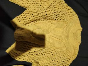 Yellow knitted sweater
