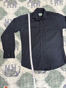 Combo of Black shirt and blue jeans