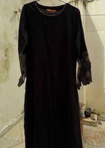 Elegant Black Kurta set with Embroidered Sleeves