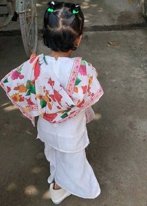 Elegant White Kurta Set with Intricate Embellishme