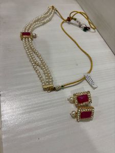 Elegant Pearl Choker with Red Stone