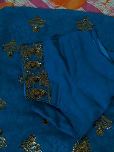 Peacock Blue Georgette Saree With Stitched Blouse