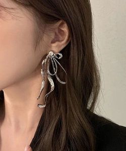 Silver Bow/Ribbon Drop Earrings Statement piece