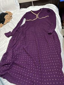 Elegant Purple Gown with Gold Print