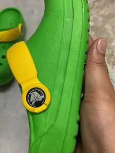 Green Crocs with Yellow Straps