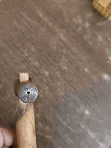 Hammer with wood stick