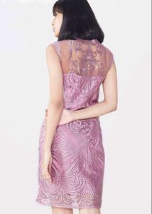 Elegant Lace Overlay Dress from the brand AND.