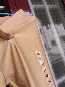 New gold shimmer Leggings with Tag