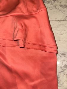 Coral Peplum Strapless Dress