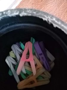 Colorful Clothespins in Jar