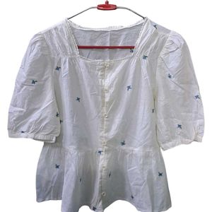 White Embroidered Peplum Top
