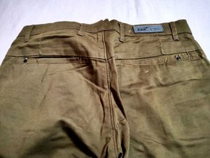 olive green or subtle brown shade pant of 32 size