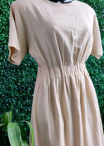 beige colour dress