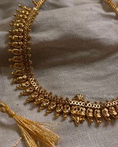 Elegant Gold Tone Necklace with Tassel
